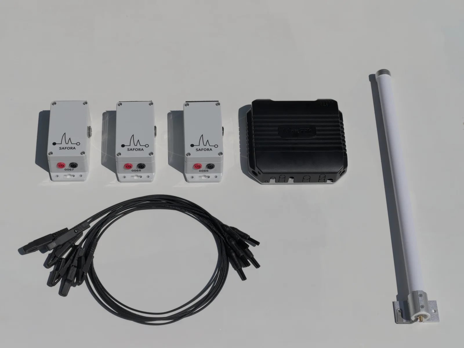 Safora Fence Monitoring Starter Kit — three Fence Shields, LoRaWAN gateway, antenna, and cables